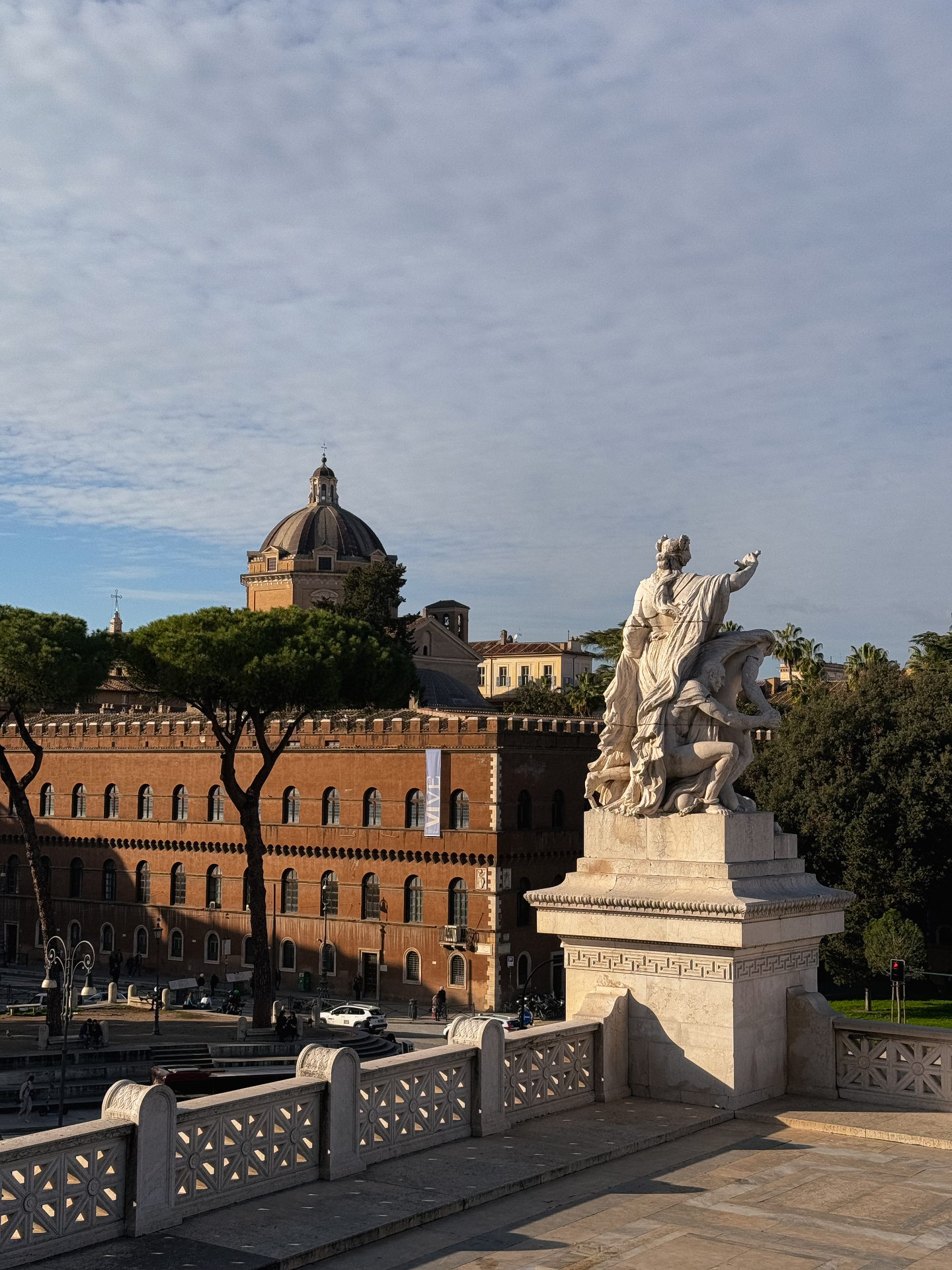 Rome city view with statue and historic architecture